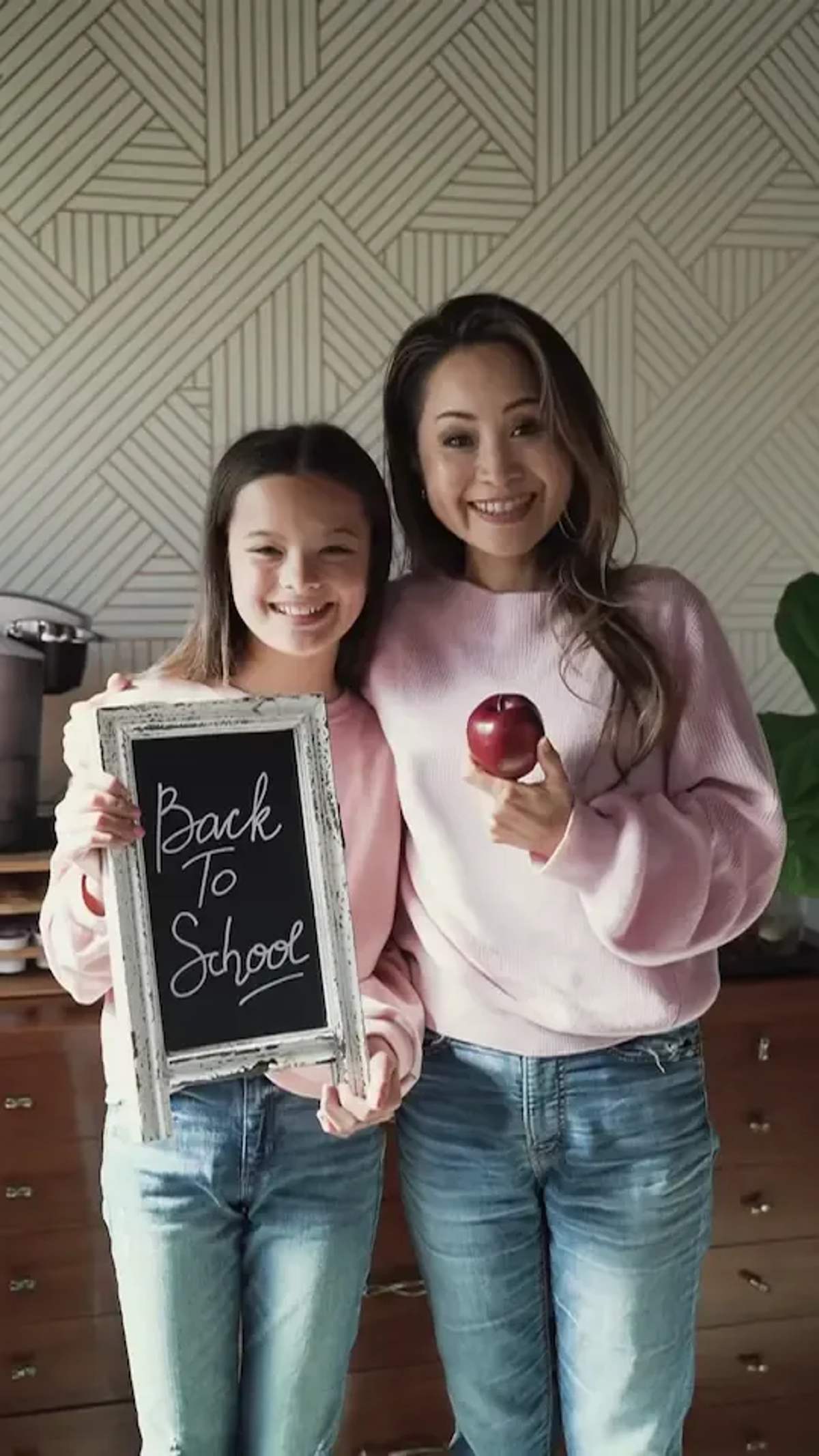 A mother and daughter reading together