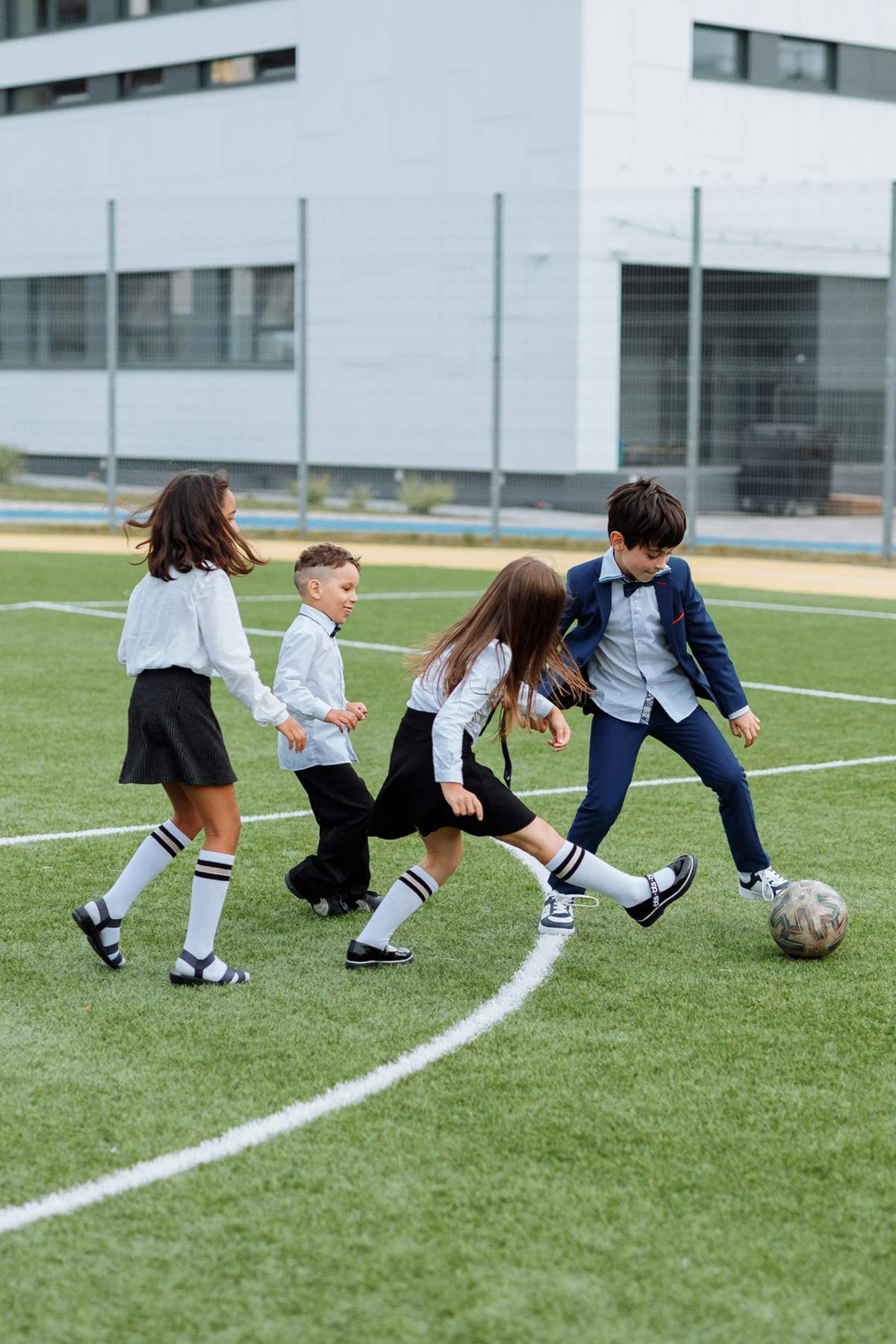 Students playing soccer