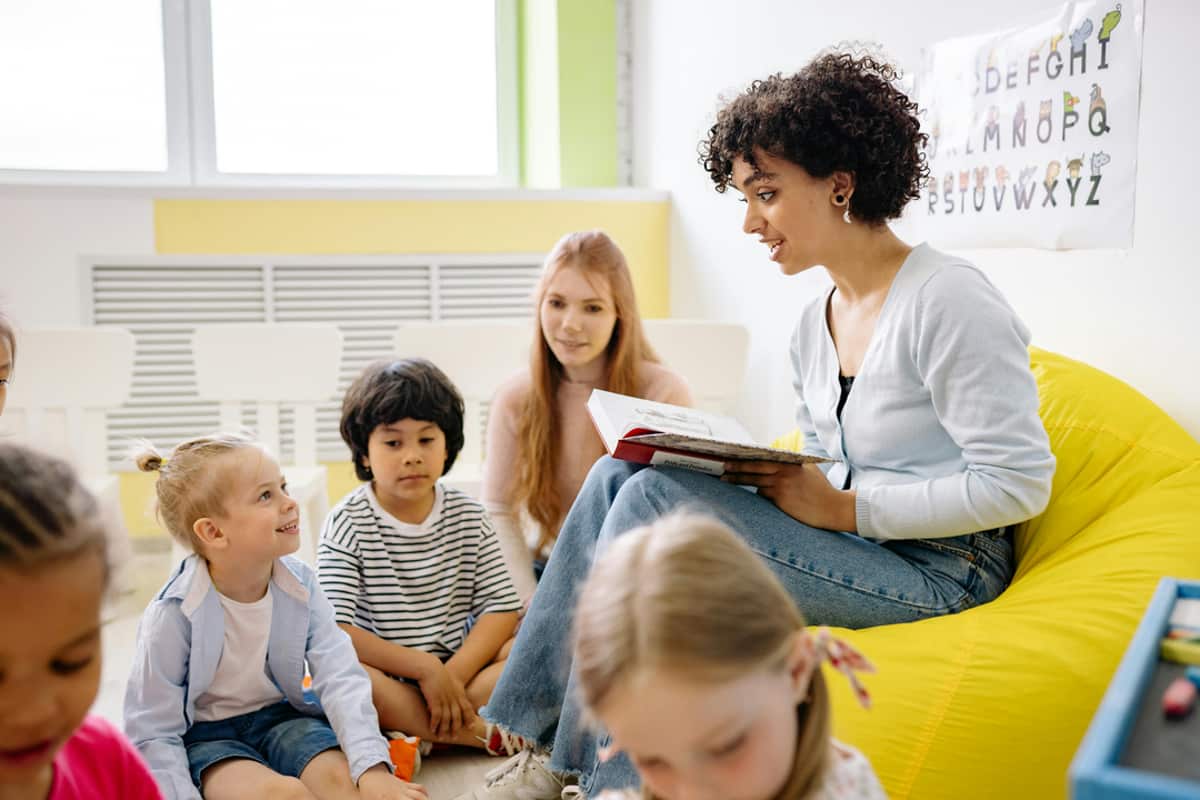 A teacher reading with students
